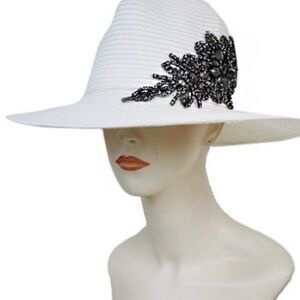 Elegant White Hat with Black Embellishment